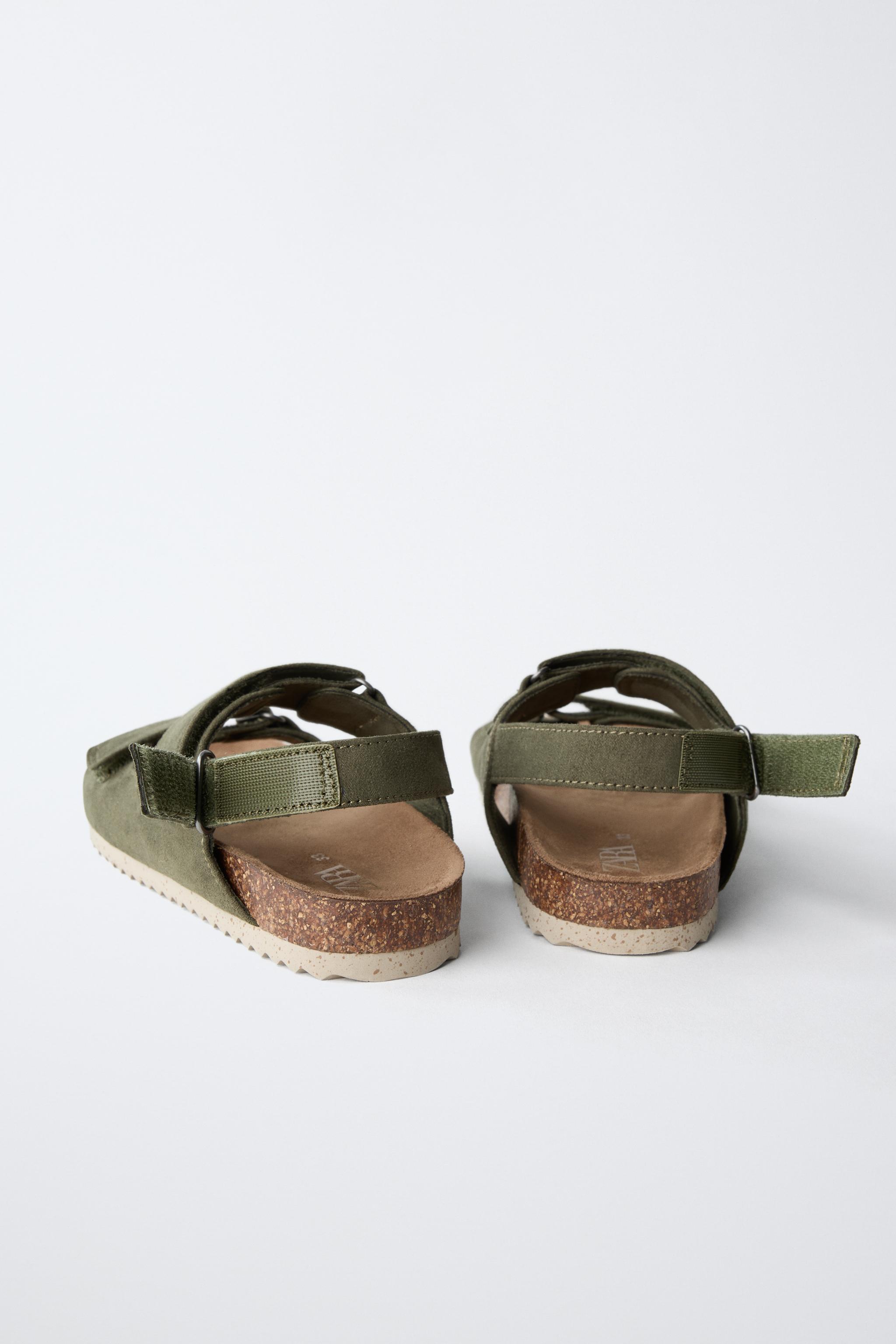 BUCKLED SANDALS